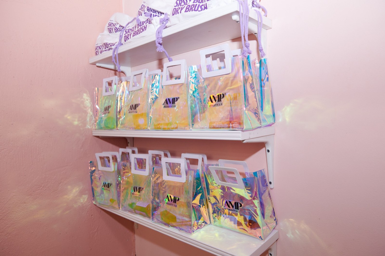 AMP Beauty brand products on a retail shelf